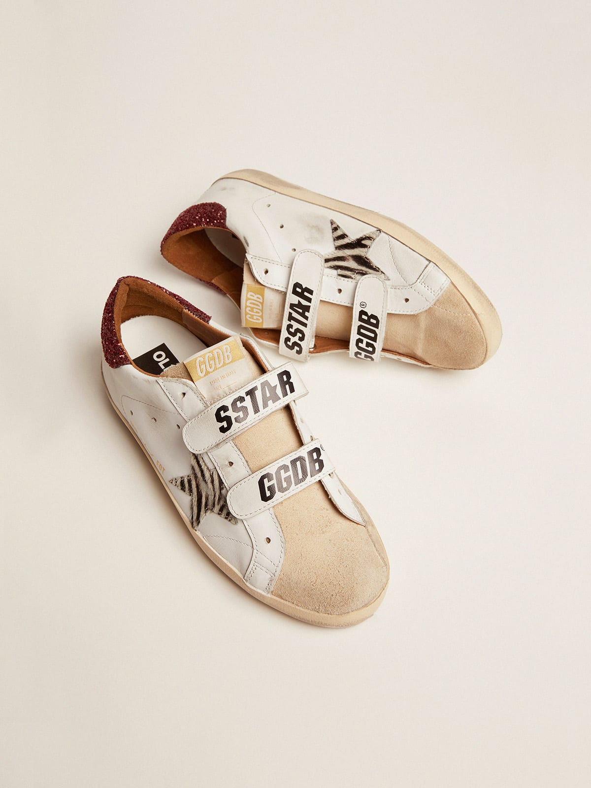 Sneaker Old School con stella in cavallino zebrato e talloncino in glitter rossi