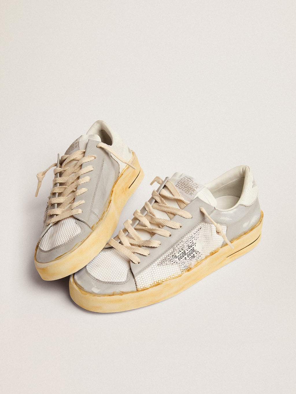 Sneaker Stardan con stella in pelle bianca con stampa GGDB e talloncino in pelle bianca cracklé
