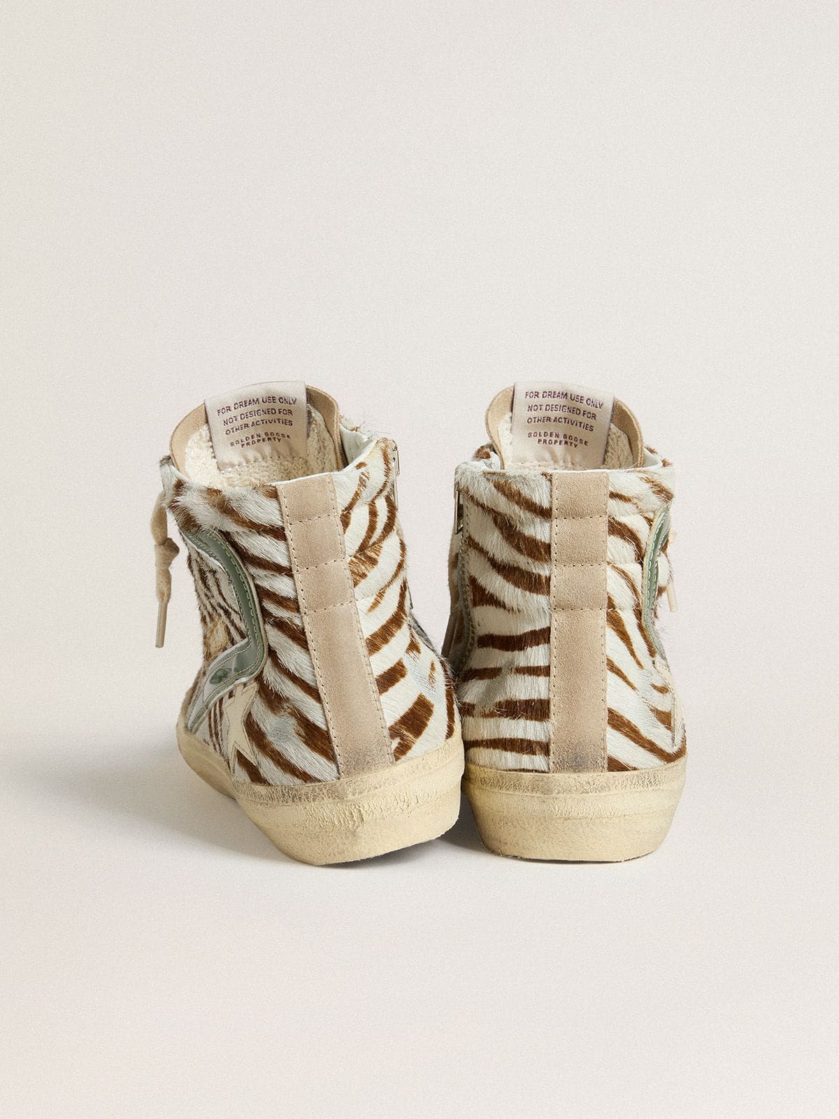 Women's Slide in zebra-print pony skin with green laminated leather flash