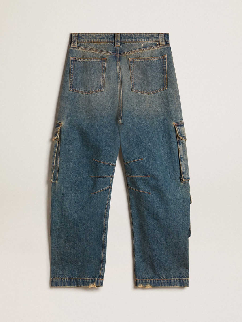 Pantalone blu jeans dal trattamento distressed