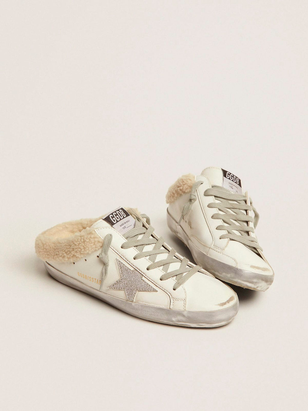 Super-Star Sabot in pelle bianca e fodera in shearling