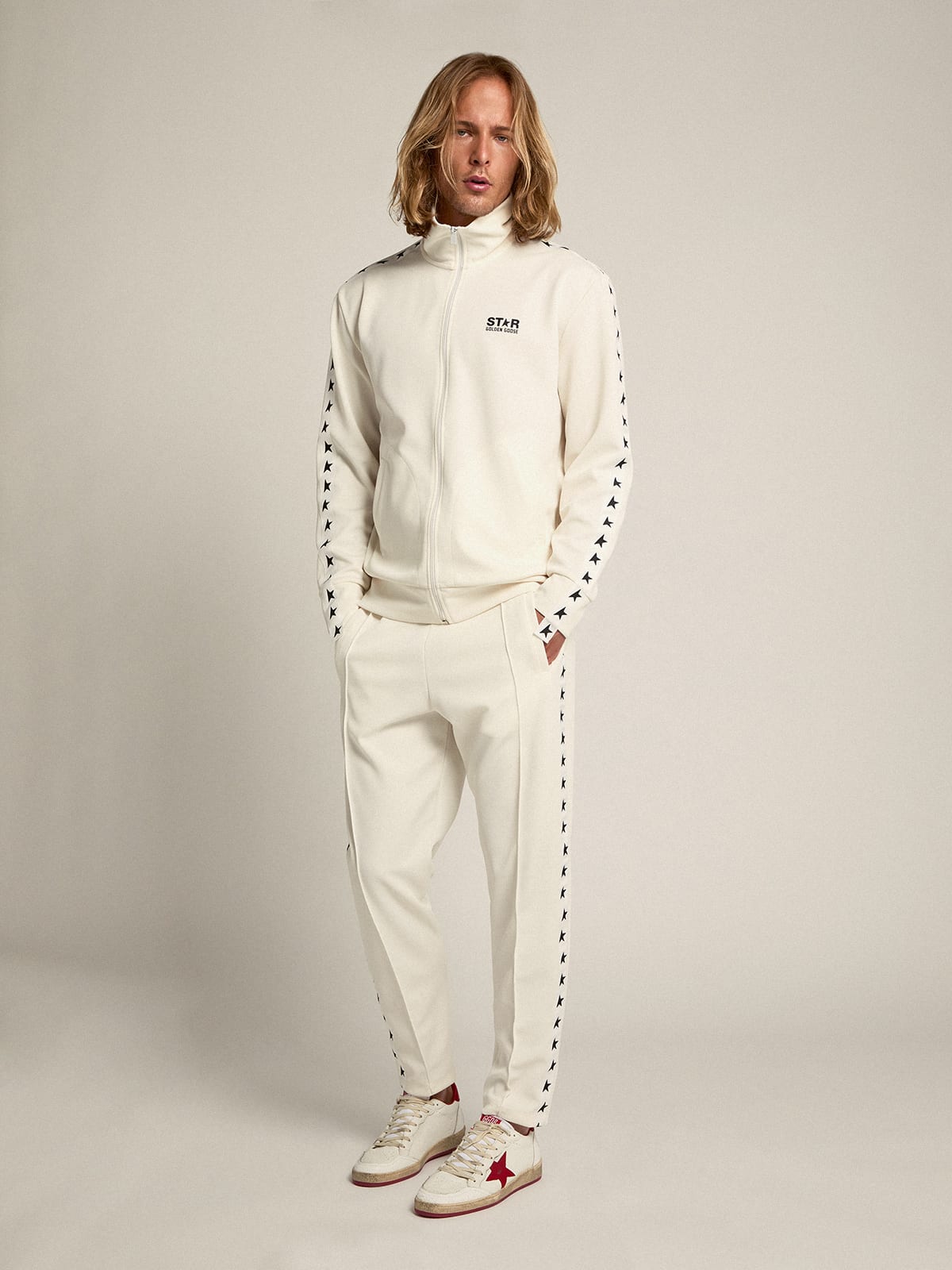 Pantalone jogging da uomo di colore bianco con stelle nere sui lati