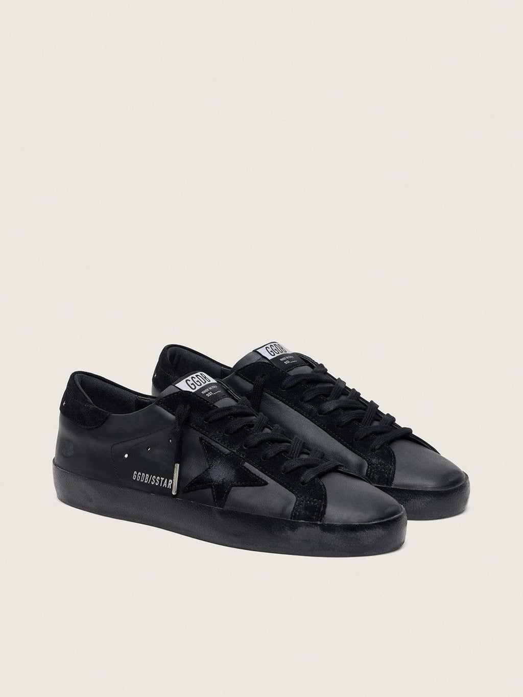 Men's Super-Star in black nappa with black suede star and heel tab