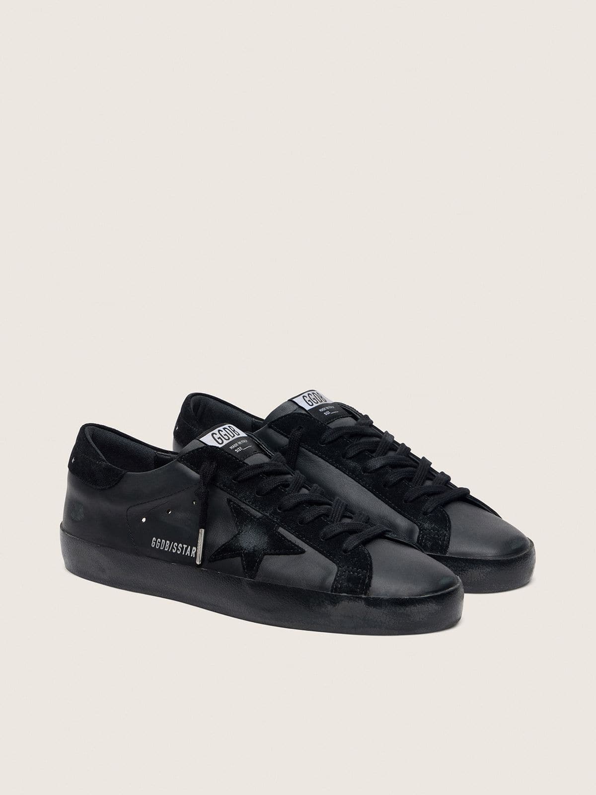 Men's Super-Star in black nappa with black suede star and heel tab