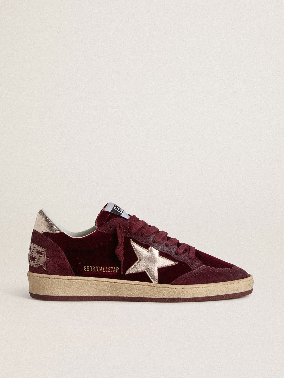 Women's Ball Star in burgundy velvet with gold metallic leather star and heel tab