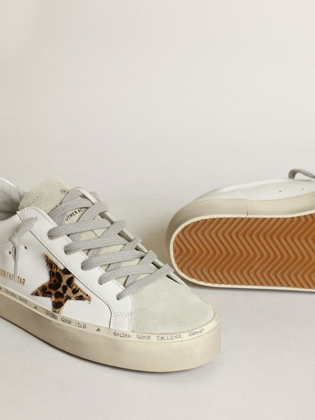 Sneaker Hi Star con stella in cavallino leopardato e talloncino in pelle laminata color argento
