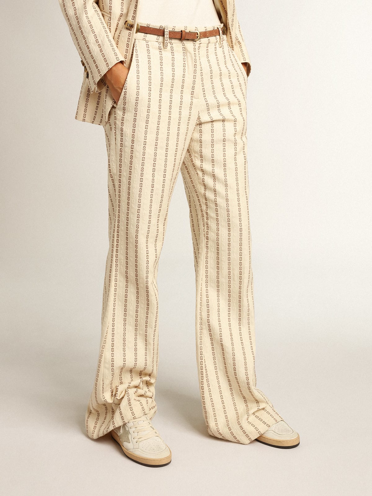 Pantalone in cotone color panna con motivo jacquard