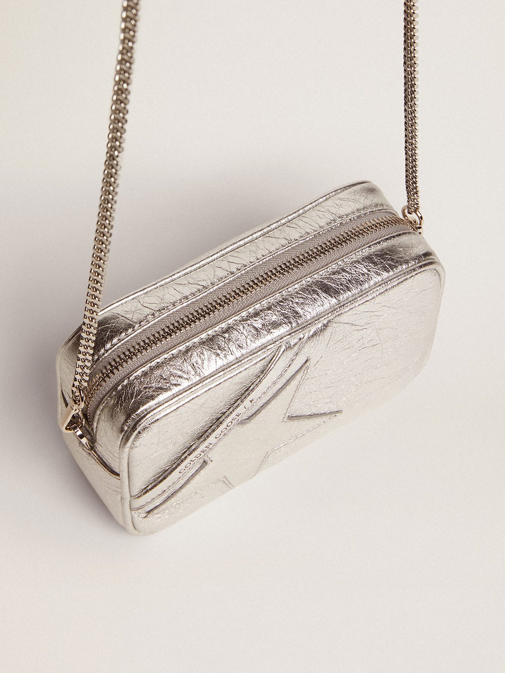 Borsa Mini Star Bag in pelle laminata color argento e stella ton sur ton