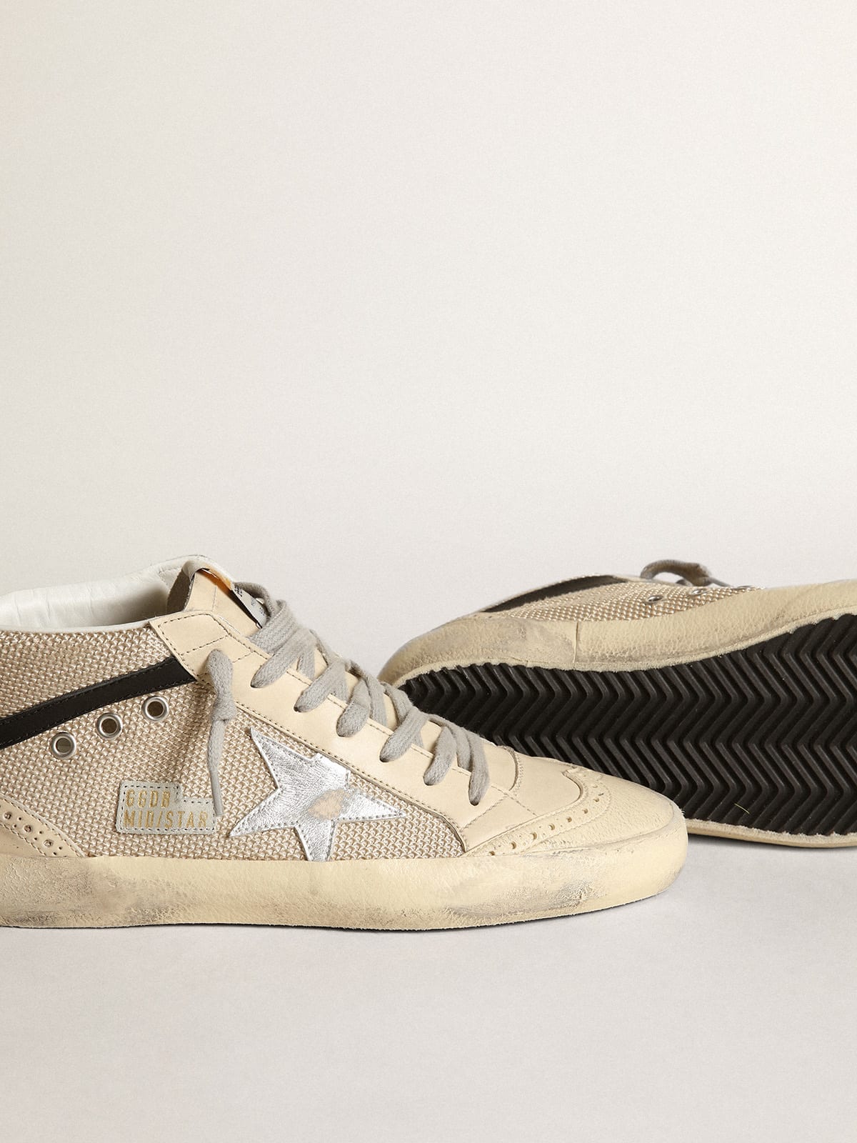 Sneaker Mid Star LTD in rete color crema con stella in pelle laminata color argento e virgola in pelle nera