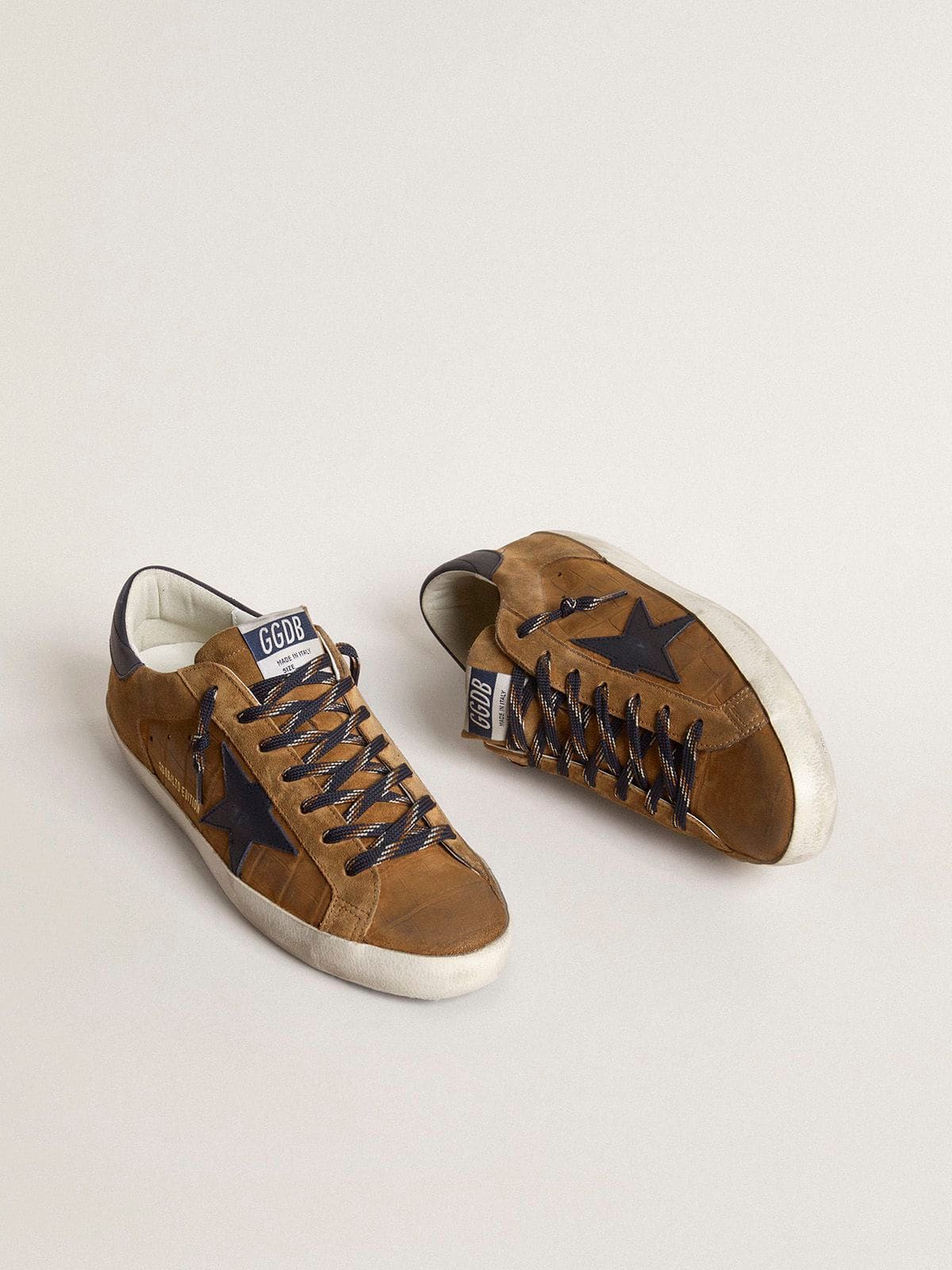 Men's Super-Star LTD in tobacco-colored croc-print leather with midnight blue leather star and heel tab