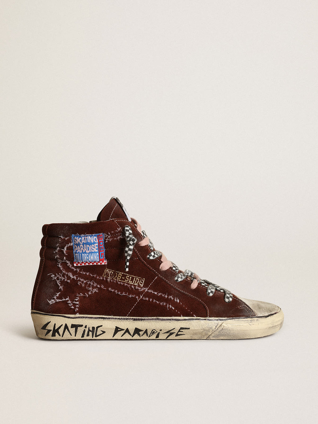 Sneaker Slide in suede color cioccolato con stella e virgola con impunture bianche