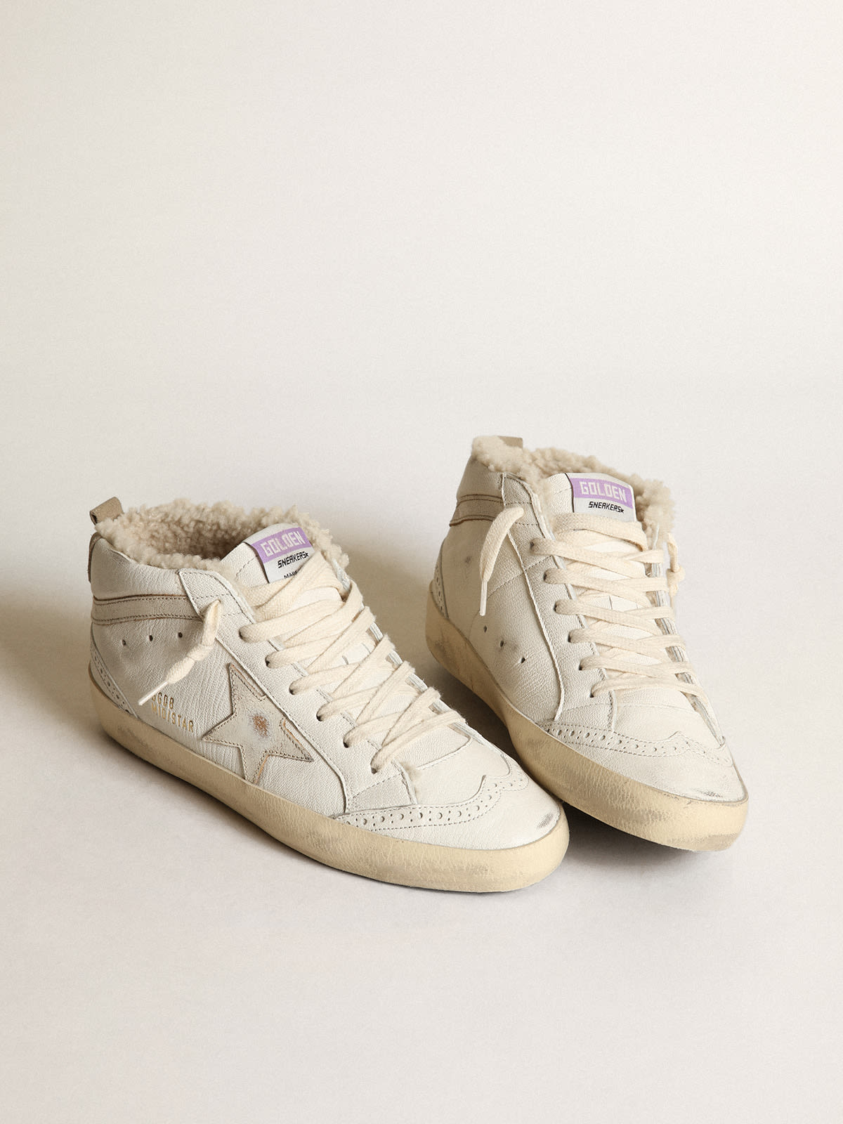 Mid Star in nappa con stella e virgola in pelle lucida bianca
