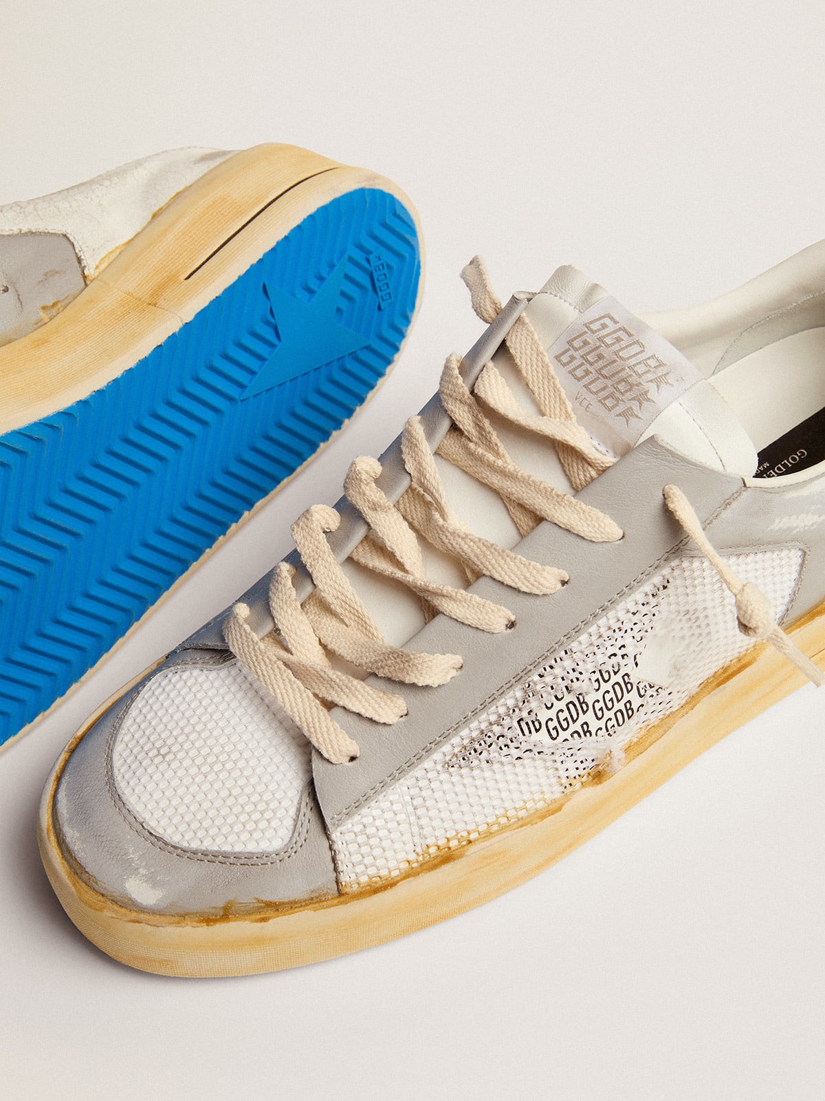 Sneaker Stardan con stella in pelle bianca con stampa GGDB e talloncino in pelle bianca cracklé