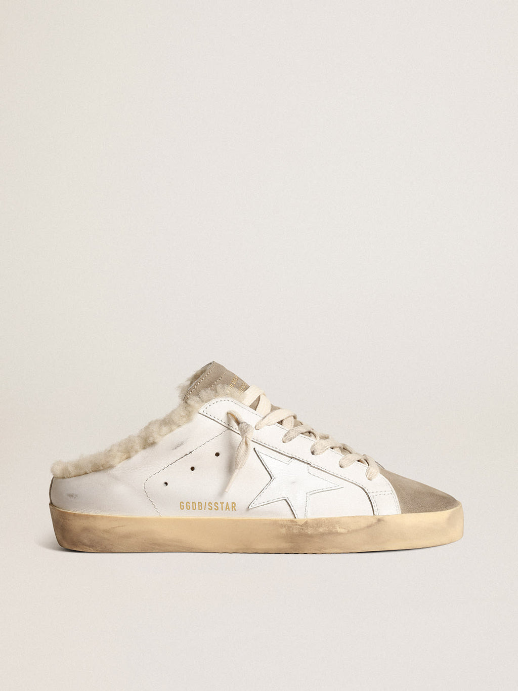 Super-Star Sabot con stella in pelle bianca e fodera in shearling