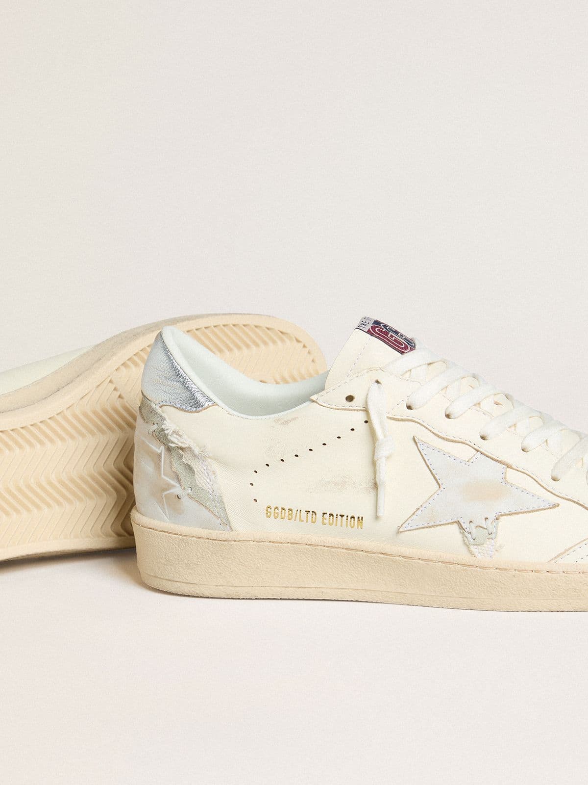 Ball Star LTD in cream with white suede star and metallic silver leather heel tab