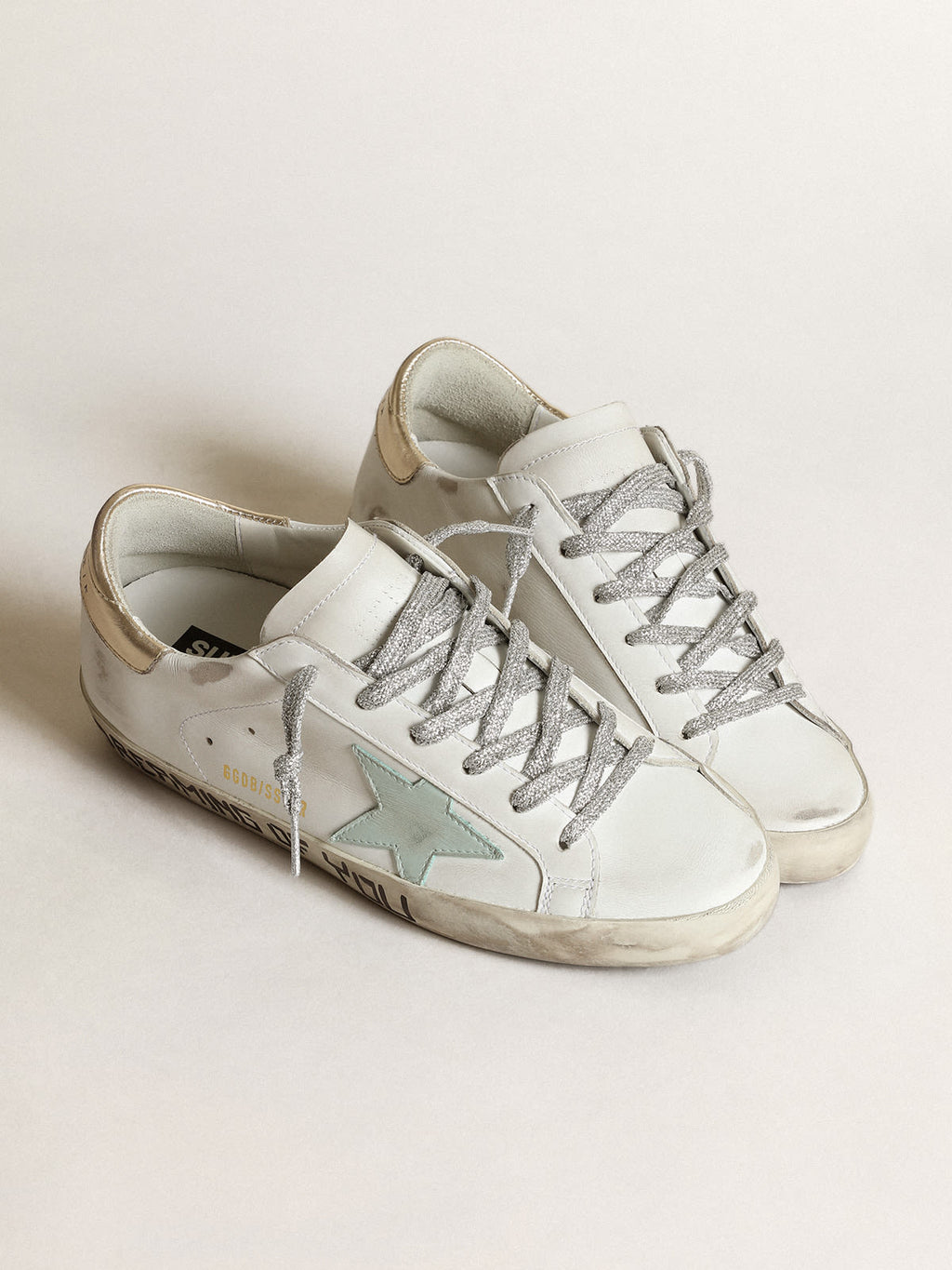 Super-Star LTD con stella acquamarina e talloncino platino