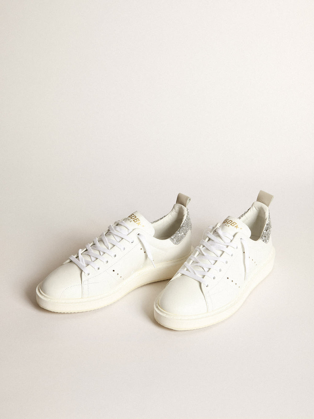 Sneaker Starter in pelle bianca con talloncino in glitter argento