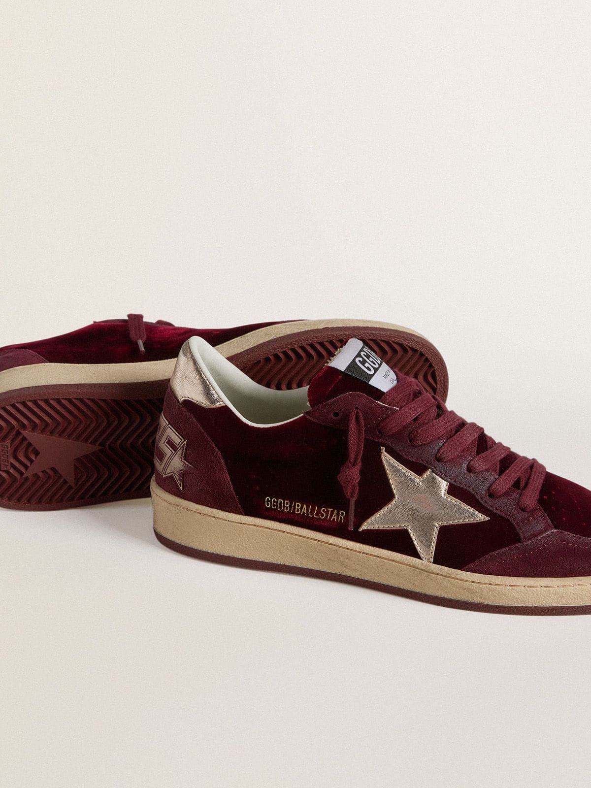 Women's Ball Star in burgundy velvet with gold metallic leather star and heel tab