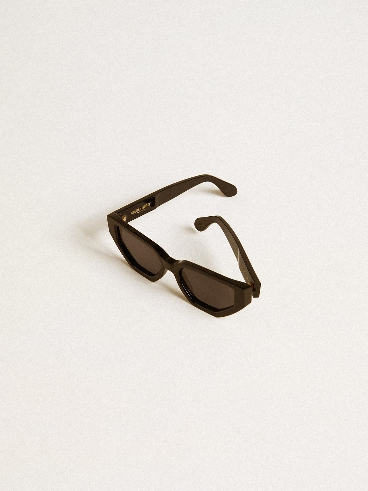 Rectangular style sunglasses with black frame and lenses