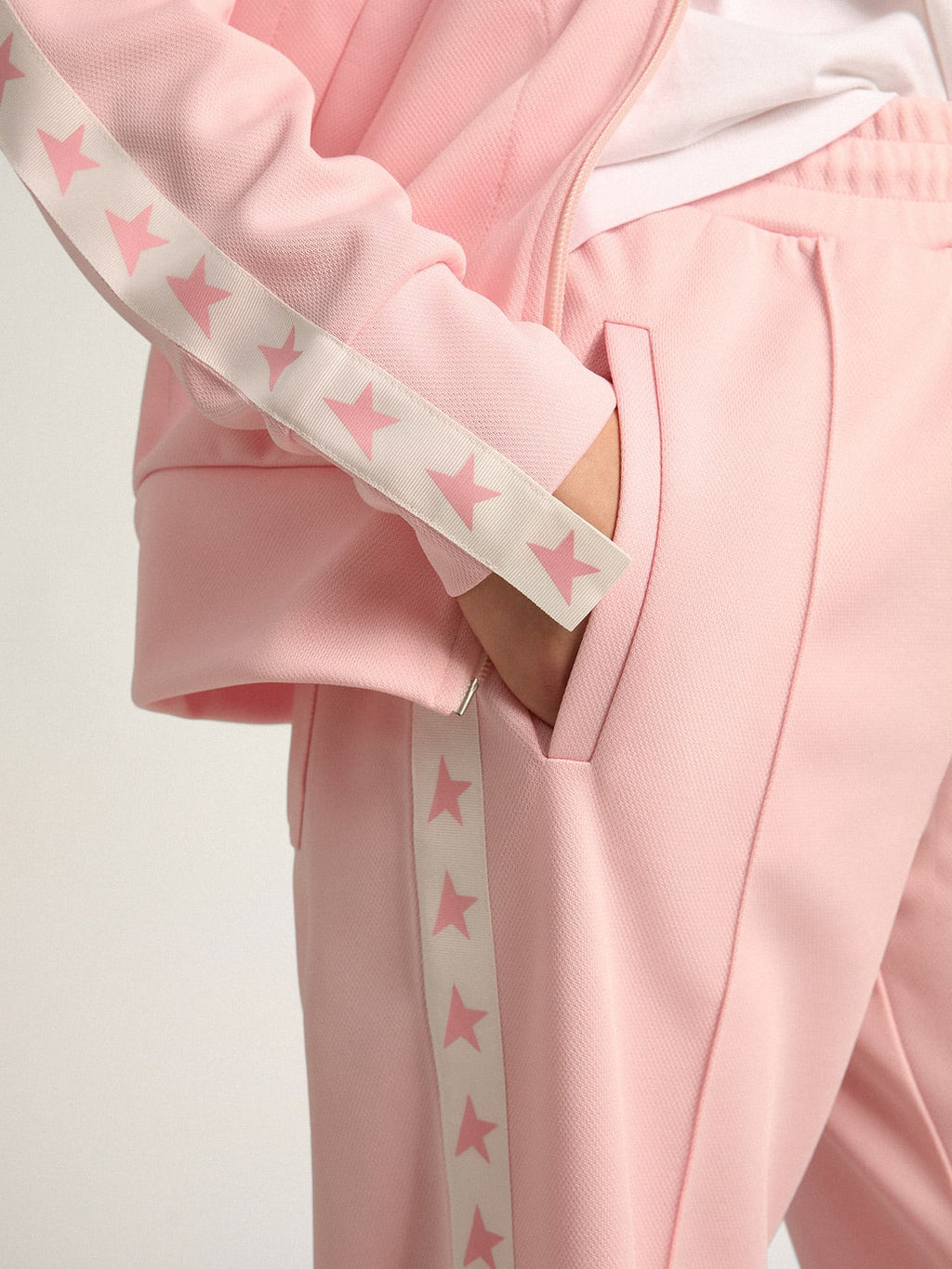 Felpa con zip da donna di colore rosa con stelle rosa a contrasto