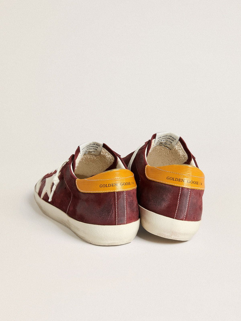 Men’s Super-Star in brick-red suede with white leather star and animal-print heel tab