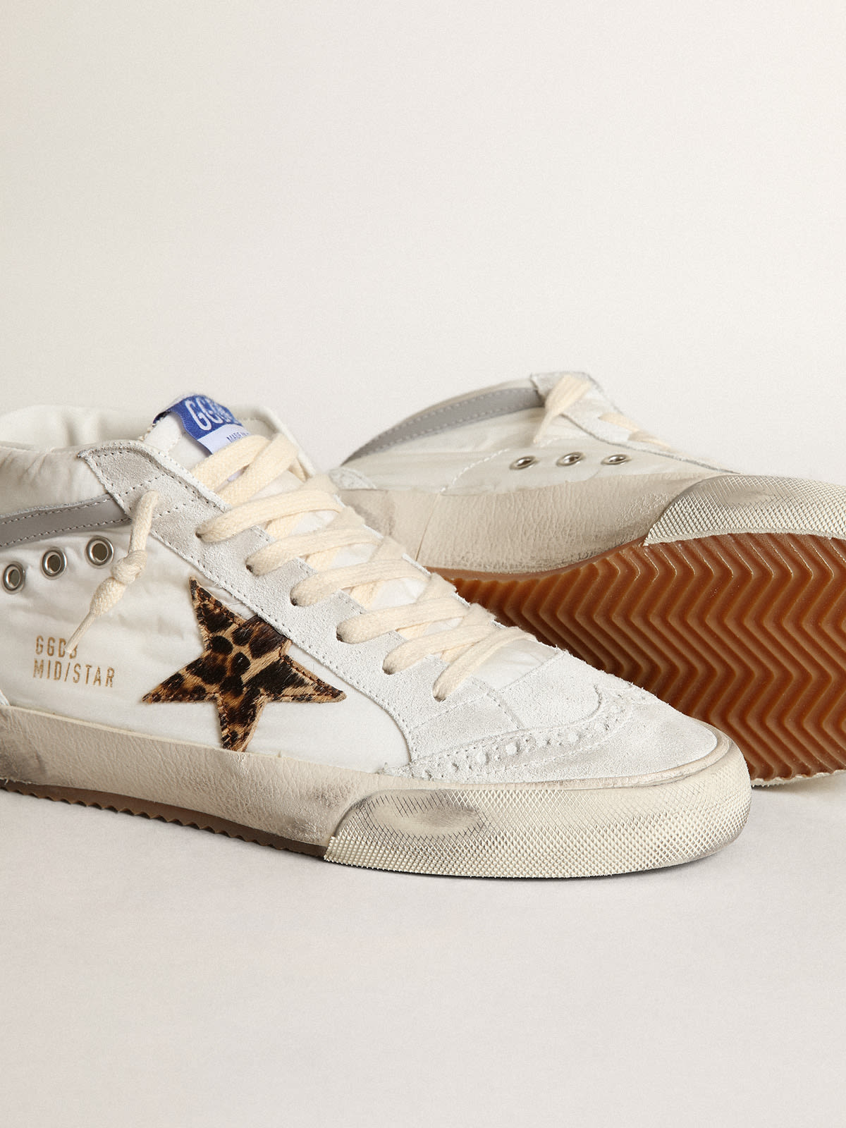 Sneaker Mid Star LTD in nylon bianco con stella in cavallino leopardato e talloncino in pelle laminata rosa