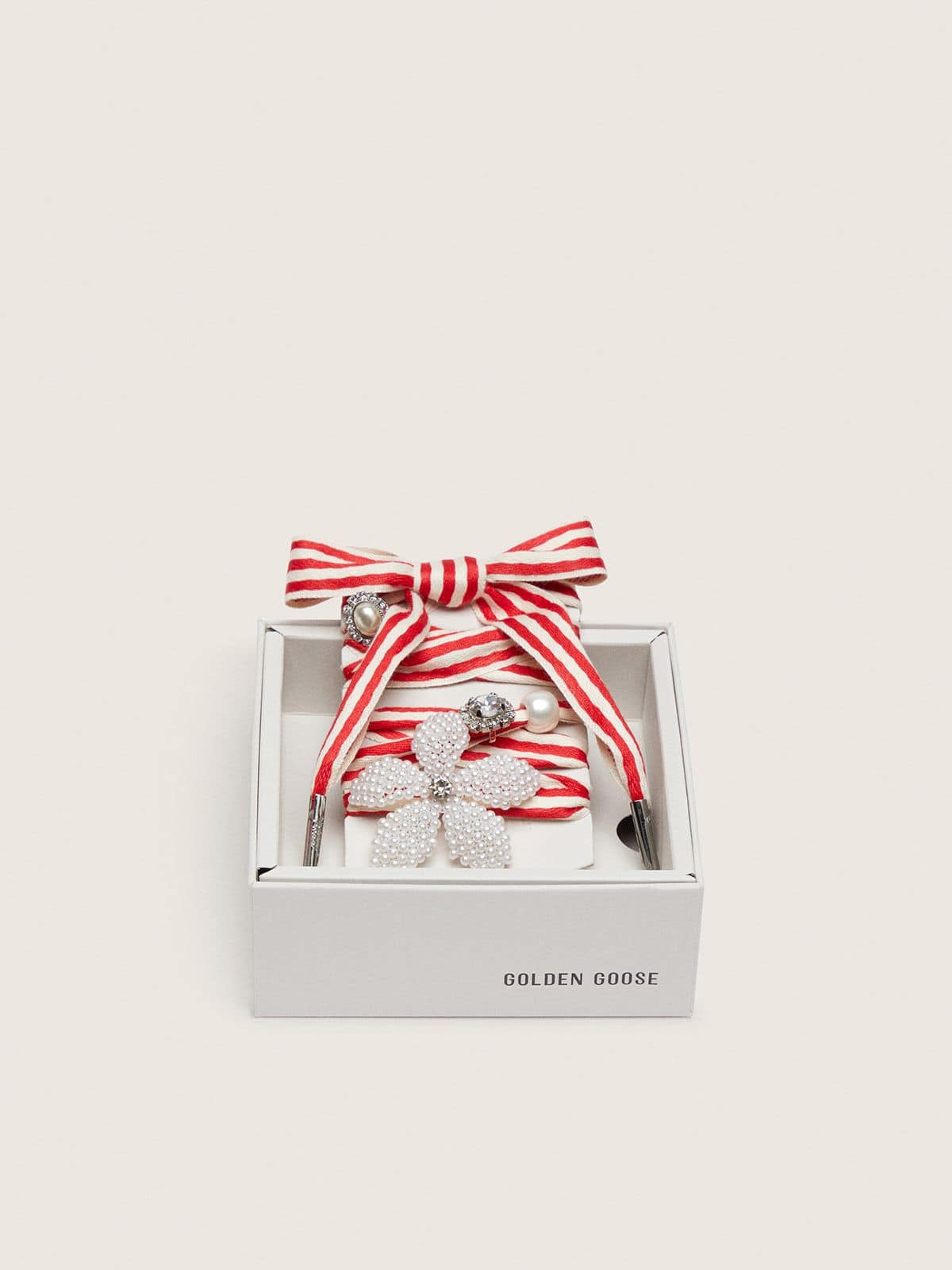 Skins "Playful" red and beige striped laces embellished with charms