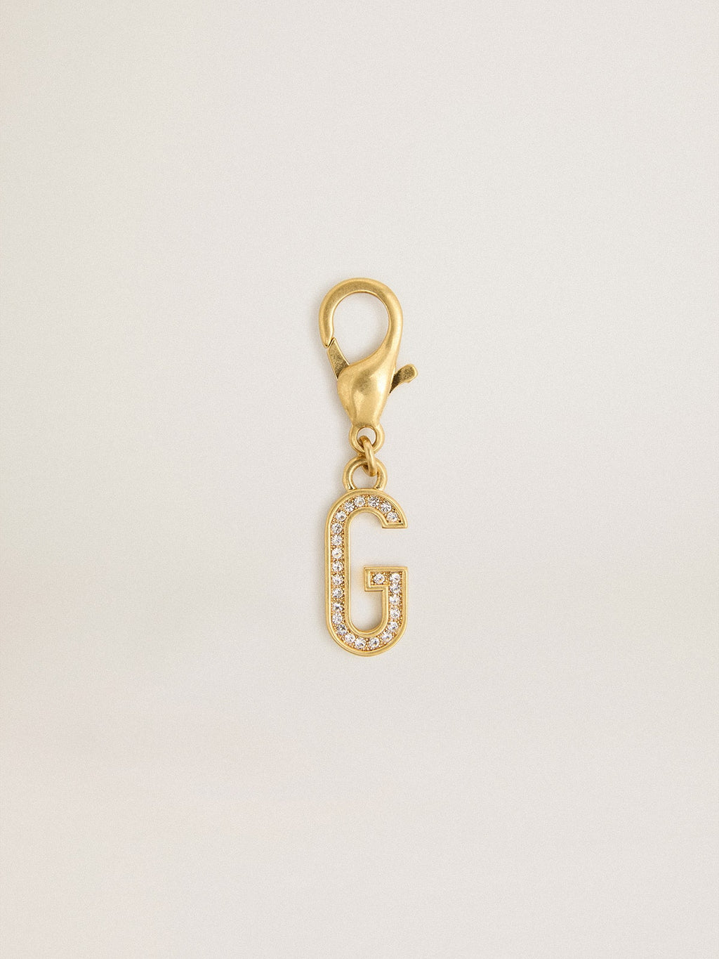 Letter G charm in gold-colored brass with crystals