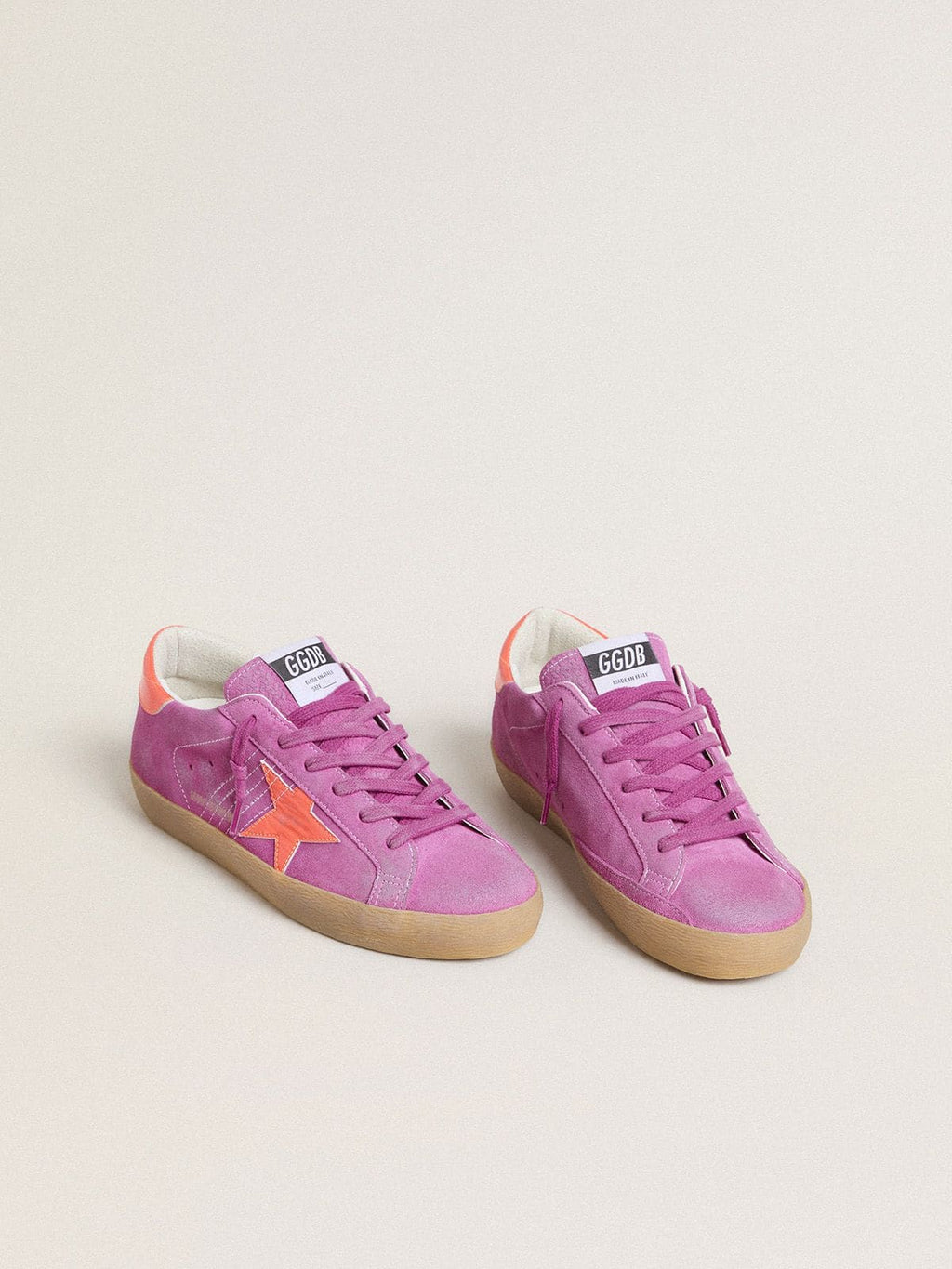 Women's Super-Star in fuchsia suede with fluorescent orange laminated leather star and heel tab