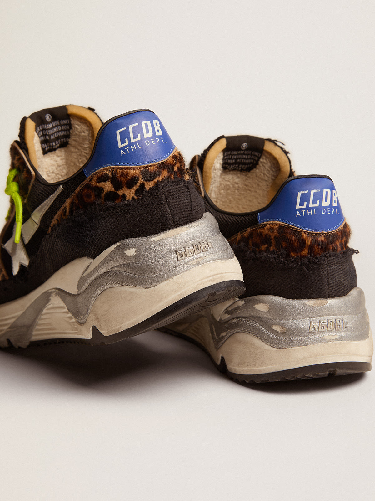 Sneaker Running Sole LTD in rete nera con inserti in cavallino leopardato e stella in pelle laminata color argento