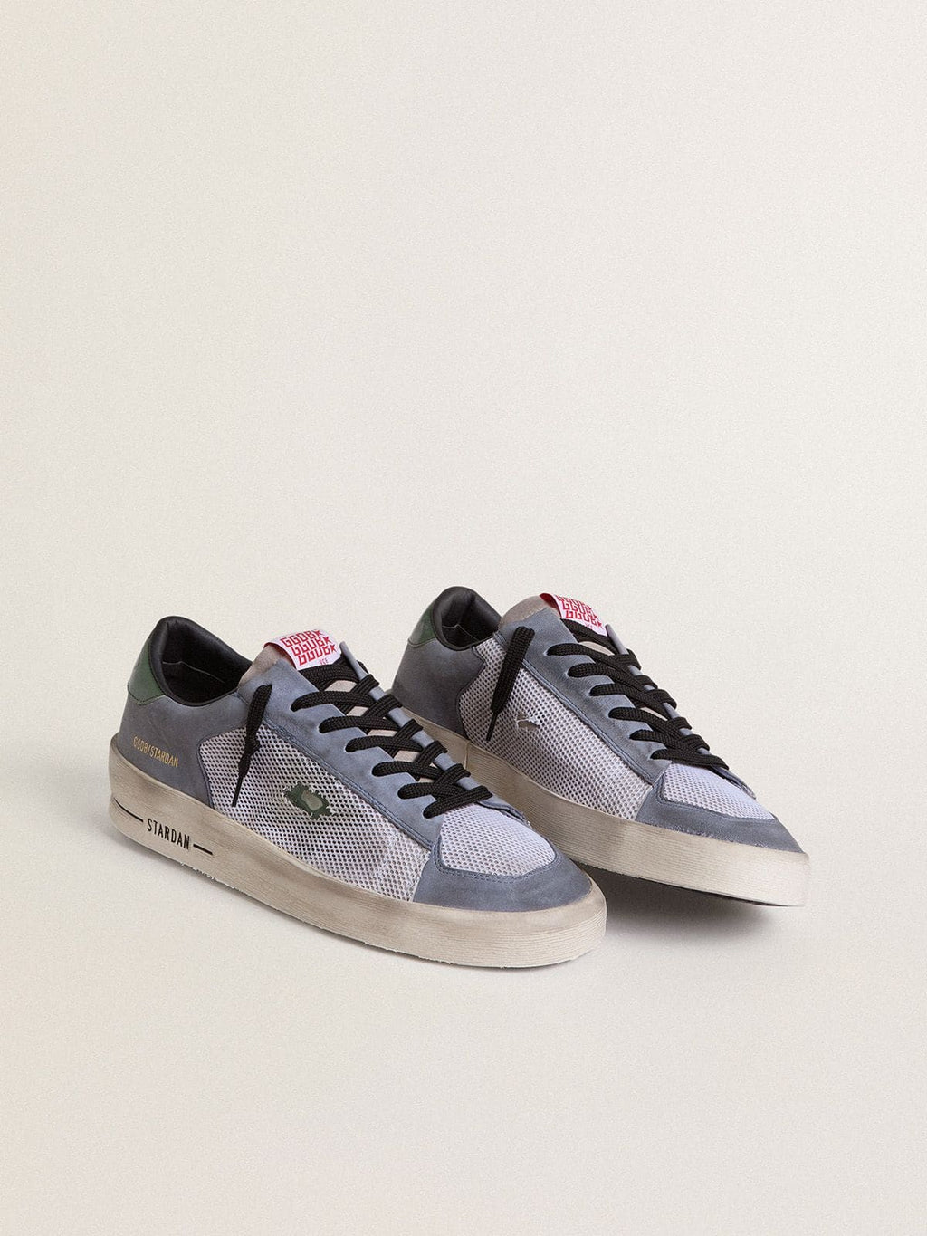 Men's Stardan in powder-blue suede with green leather star and heel tab