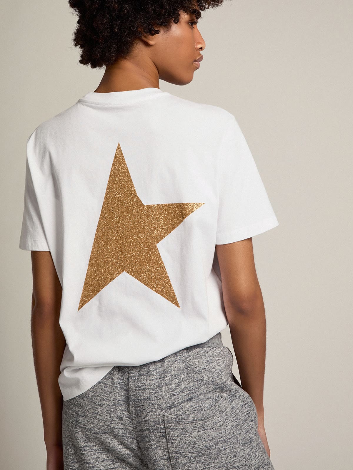 T-shirt bianca Collezion Star con logo e stella in glitter dorati