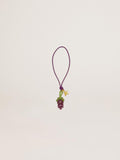 Purple and green grape bunch charm with gold star