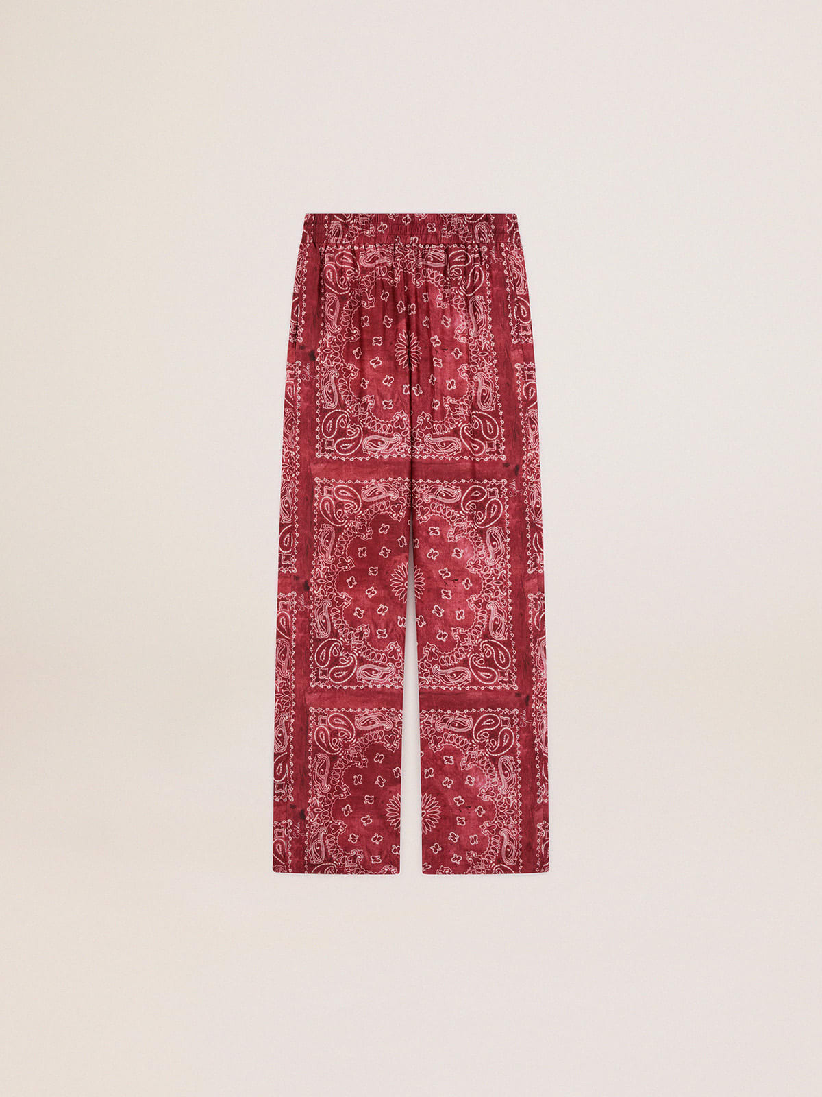 Pantalone jogging di colore bourdeaux con stampa paisley
