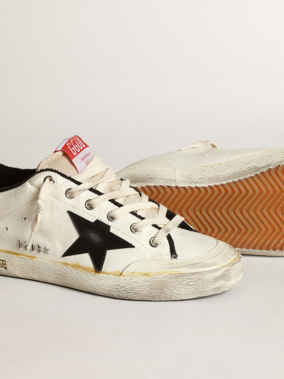 Sneaker Super-Star uomo LTD in canvas beige con stella in pelle nera e talloncino in pelle bianca