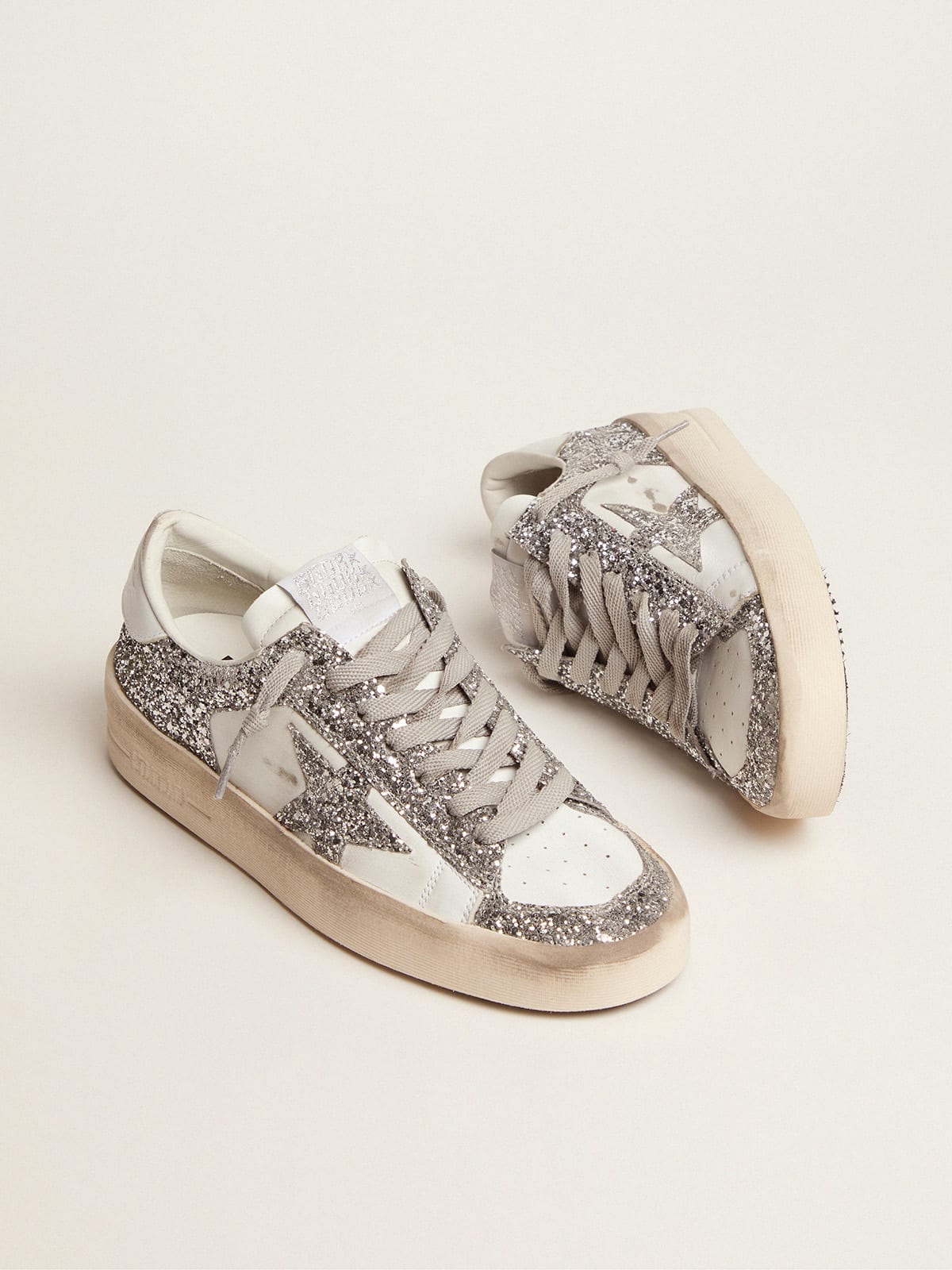 Sneaker Stardan in pelle bianca e glitter argento