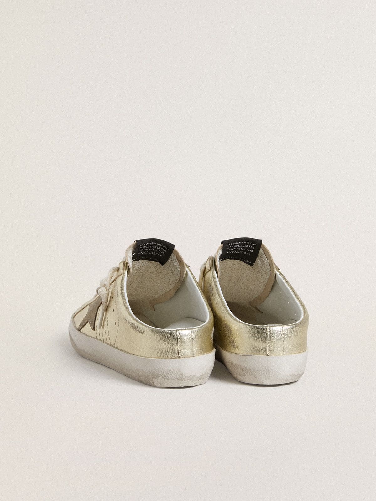 Super-Star Sabots in platinum foiled leather with beige suede star