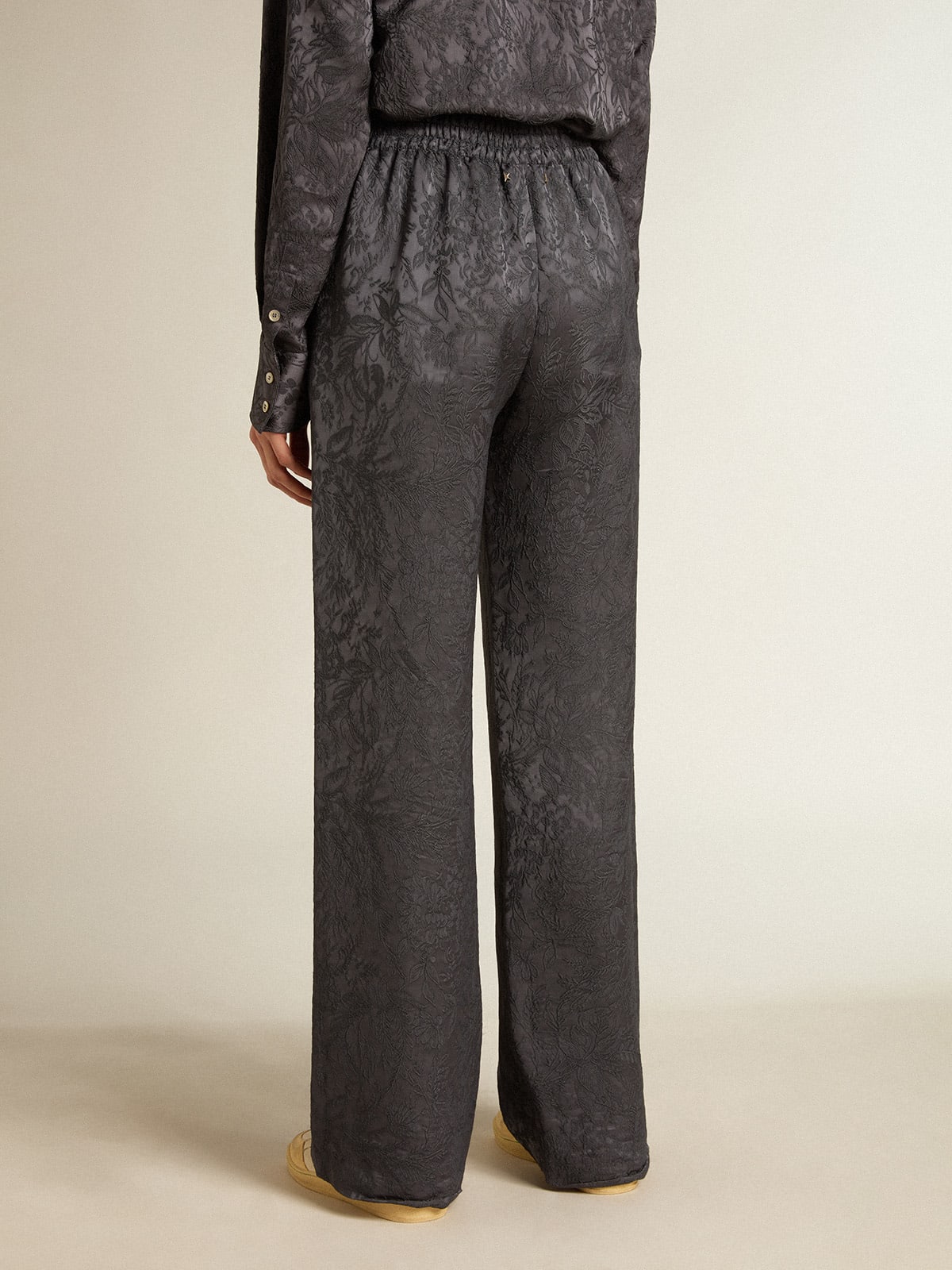 Pantalone in jacquard con motivo toile de jouy all over