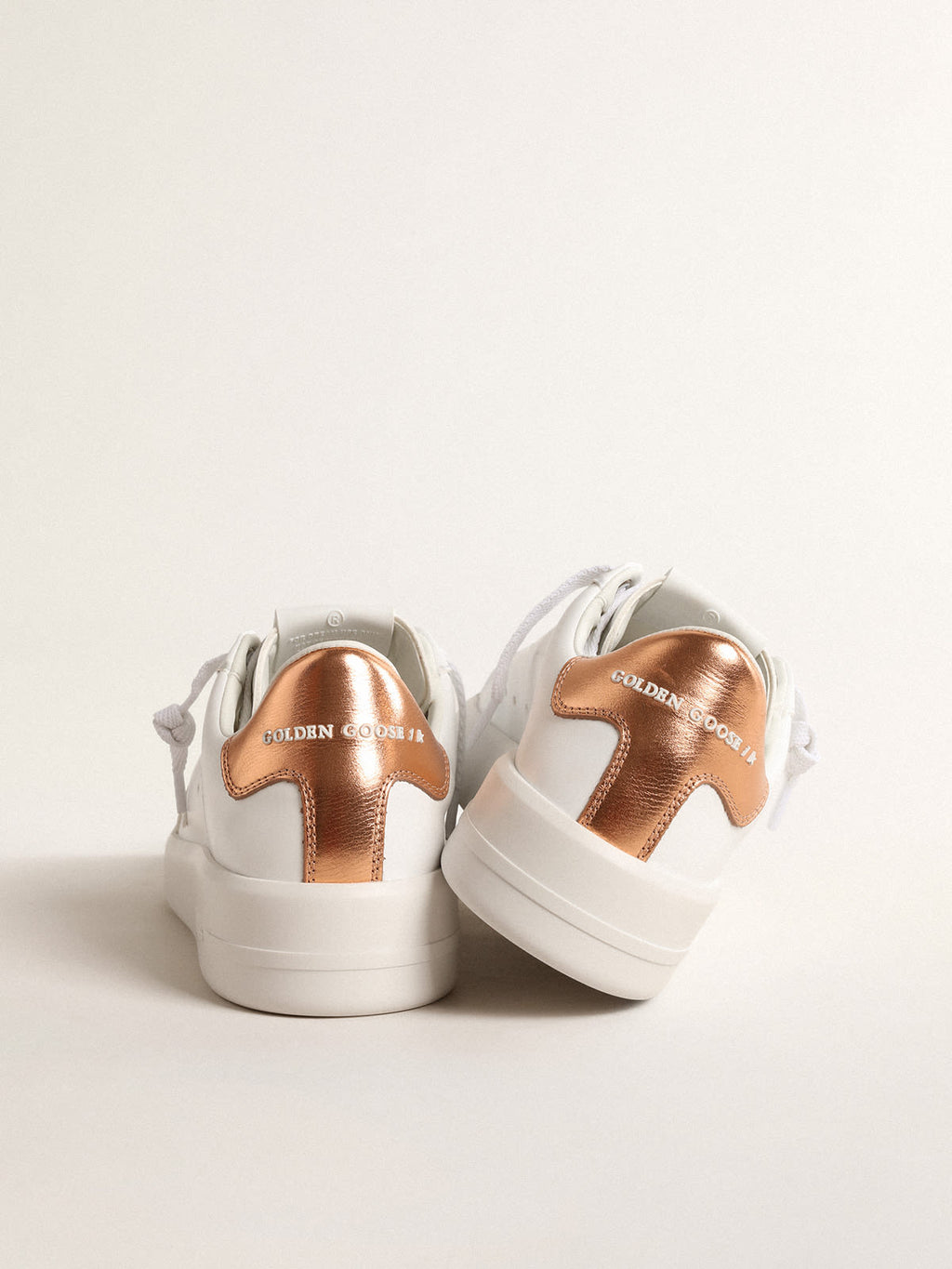 Purestar bio-based con talloncino in pelle laminata color bronzo
