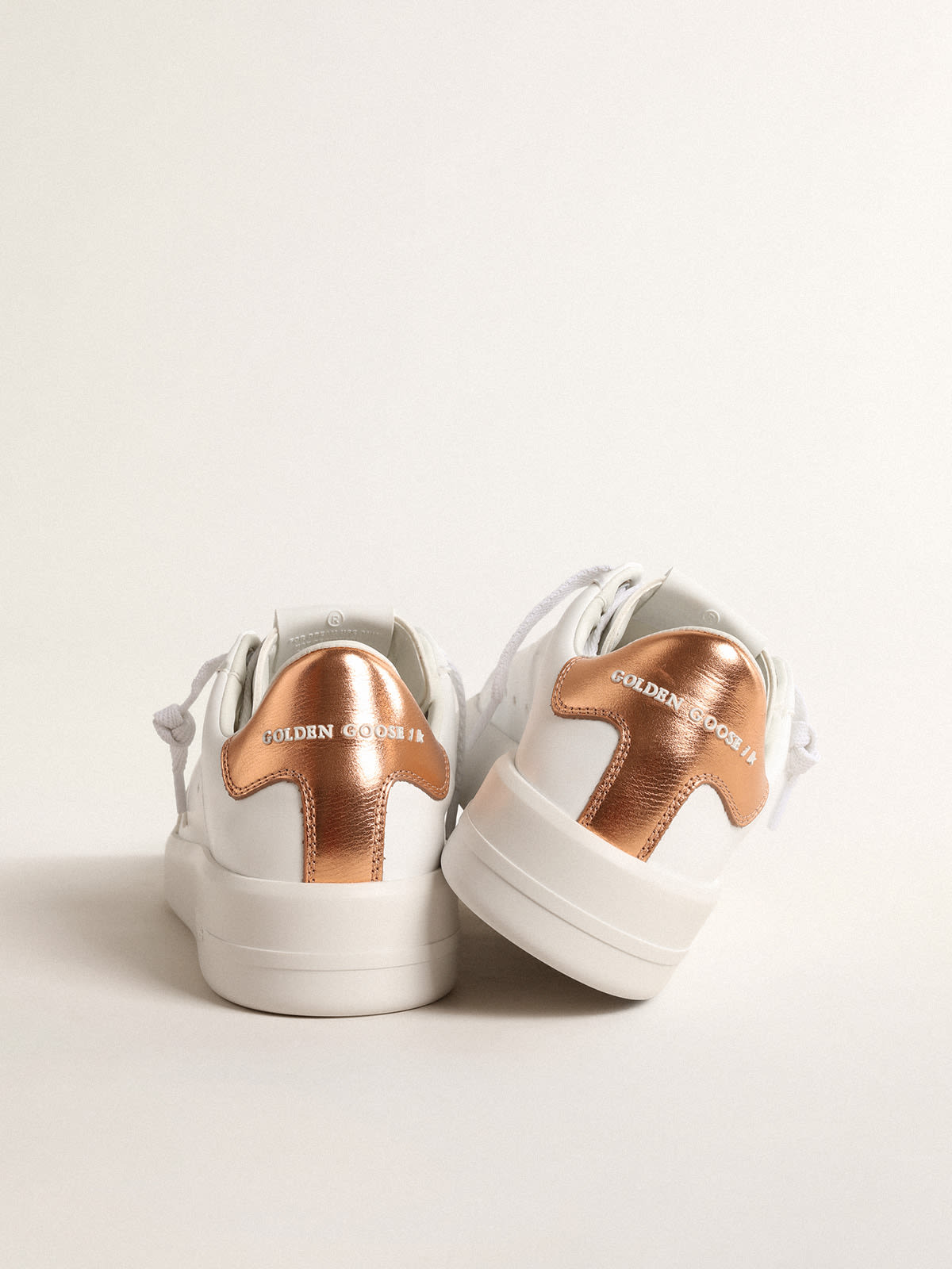Purestar bio-based con talloncino in pelle laminata color bronzo
