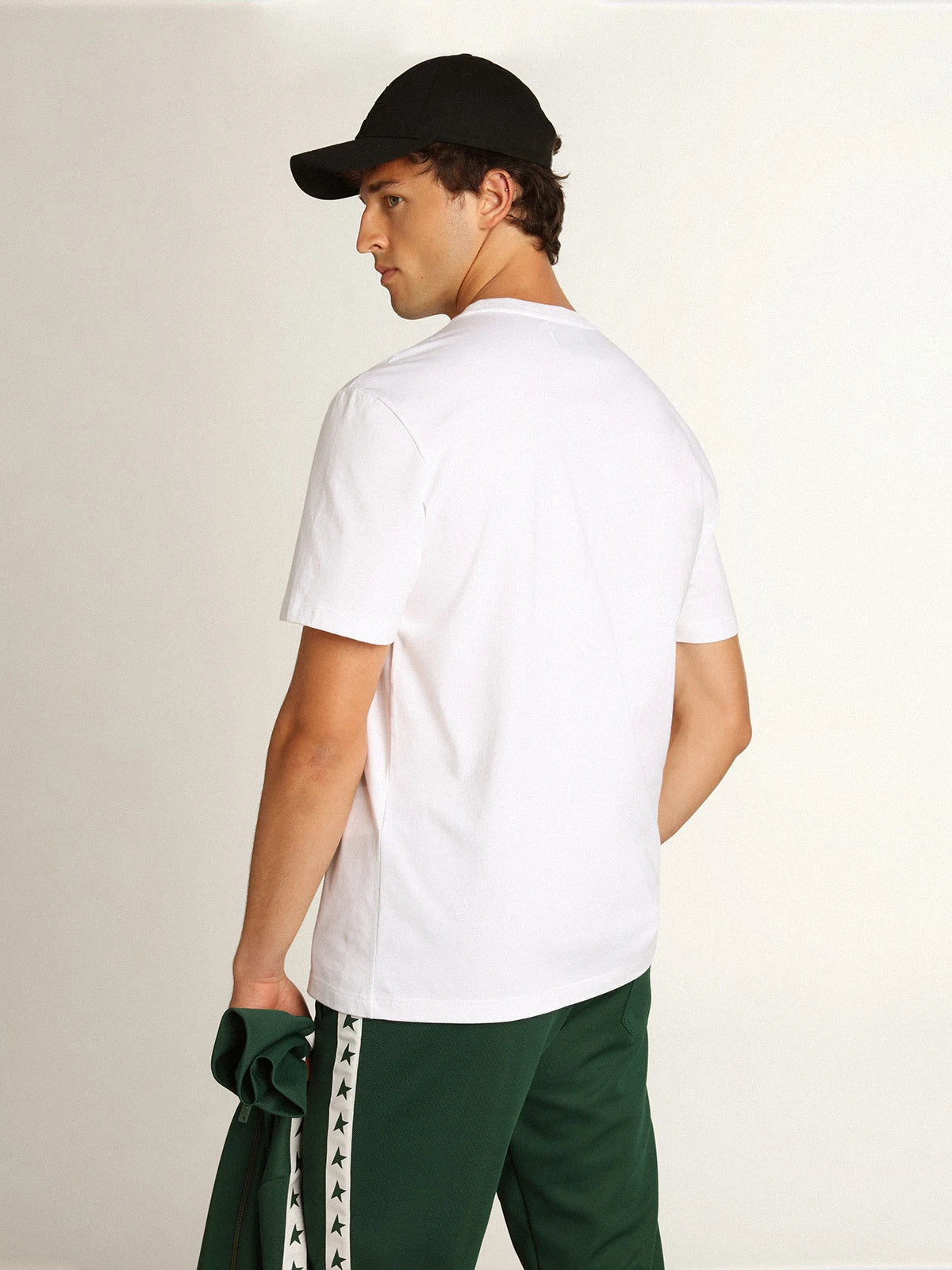 T-shirt bianca Collezione Star con stella verde a contrasto sul davanti