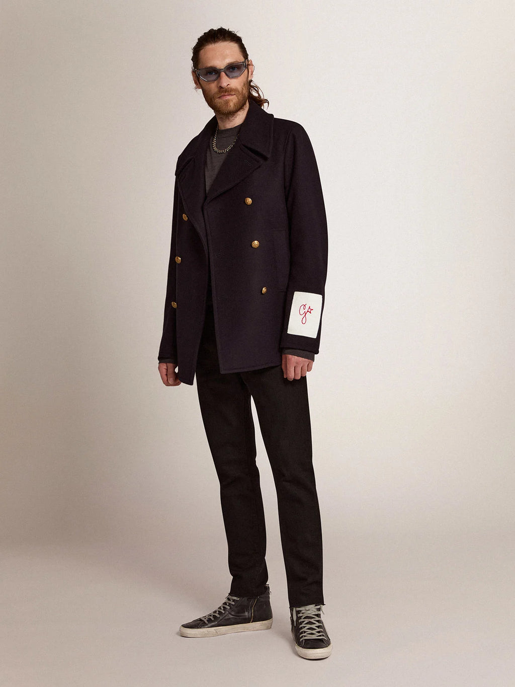 Peacoat da uomo blu scuro con bottoni araldici dorati