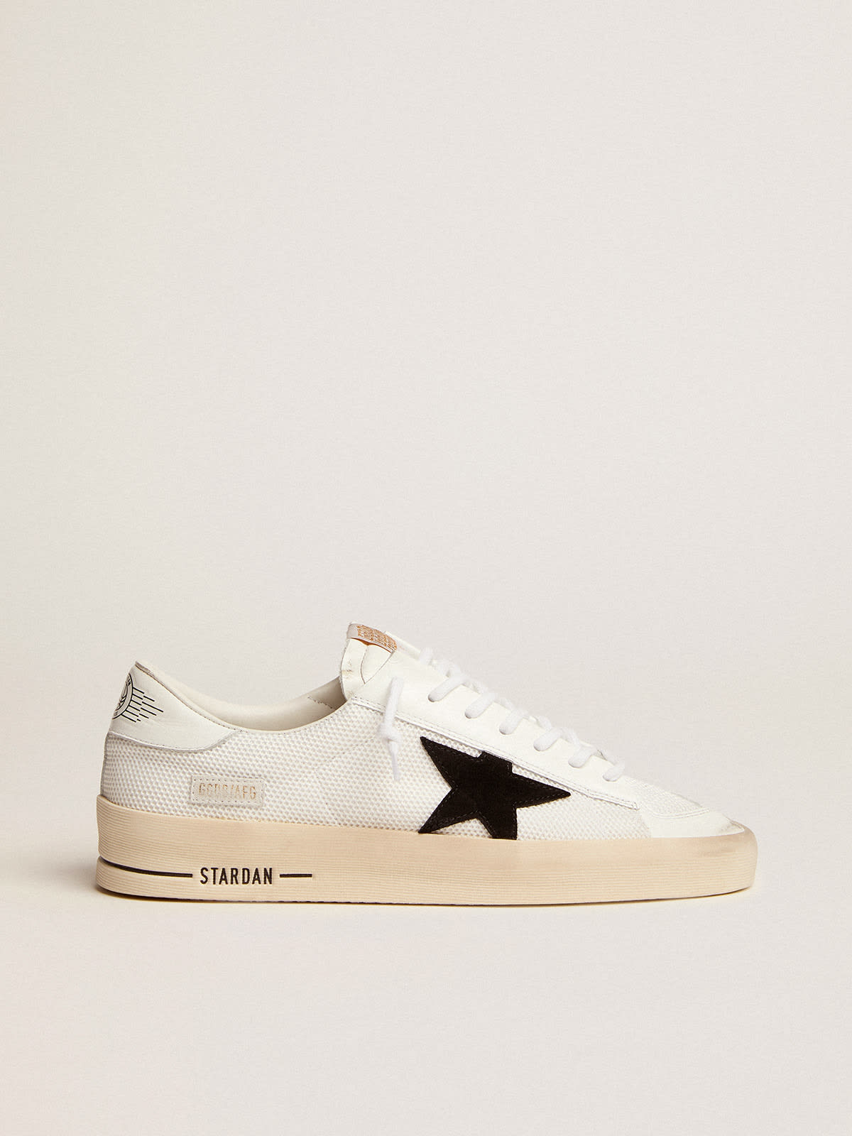 Sneaker Stardan in rete bianca con stella in suede nero e talloncino in pelle bianca
