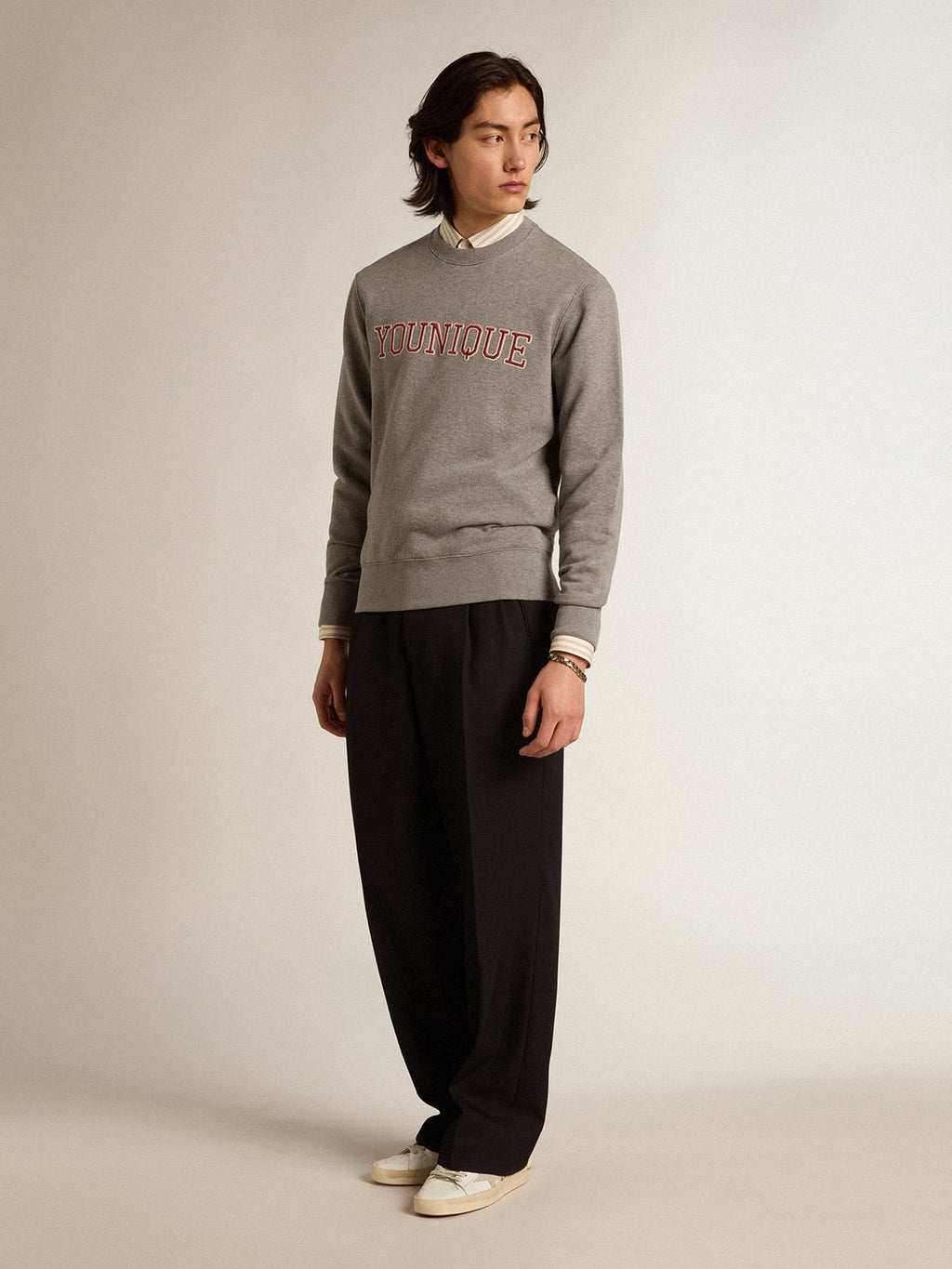 Felpa in cotone color grigio melange con scritta ricamata