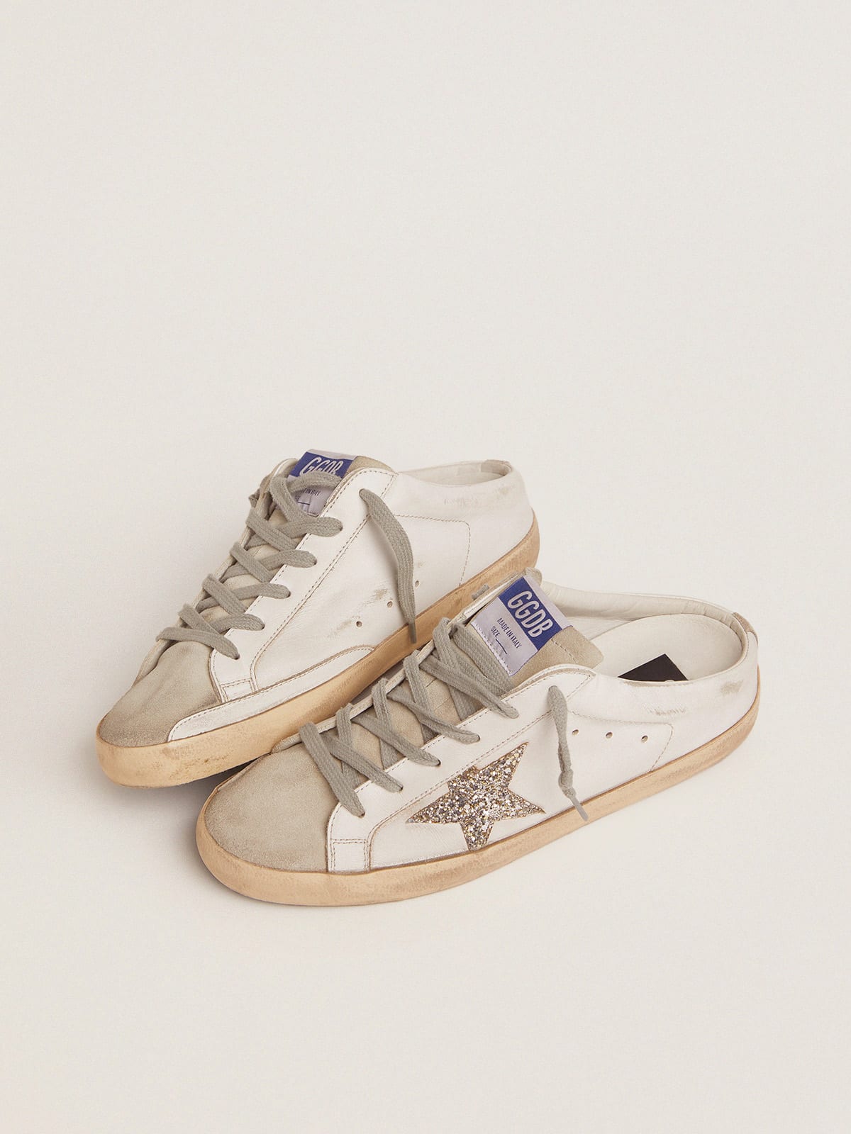 Super-Star Sabot in pelle bianca e suede grigio con stella in glitter argento