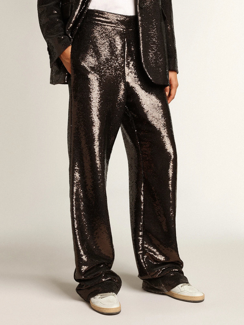 Pantalone di color grigio con paillettes all-over