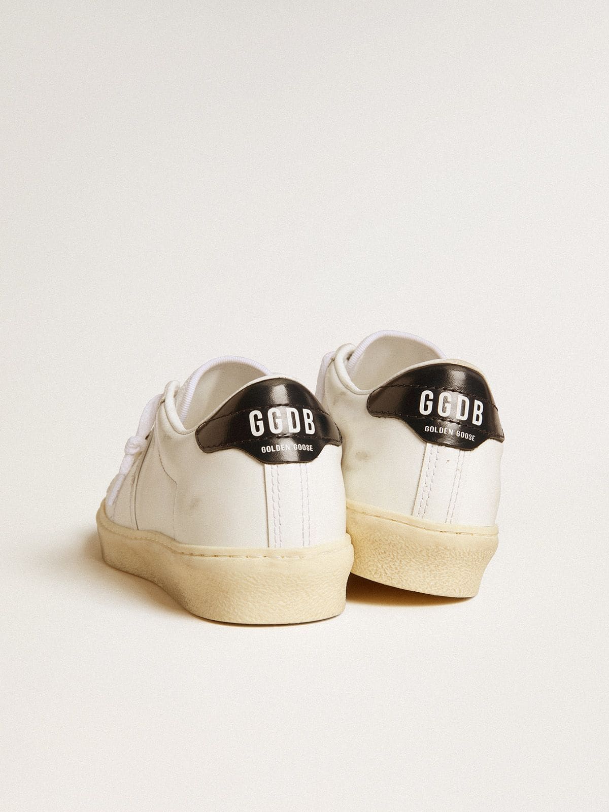 Women's Matchstar in white leather with dark blue leather heel tab