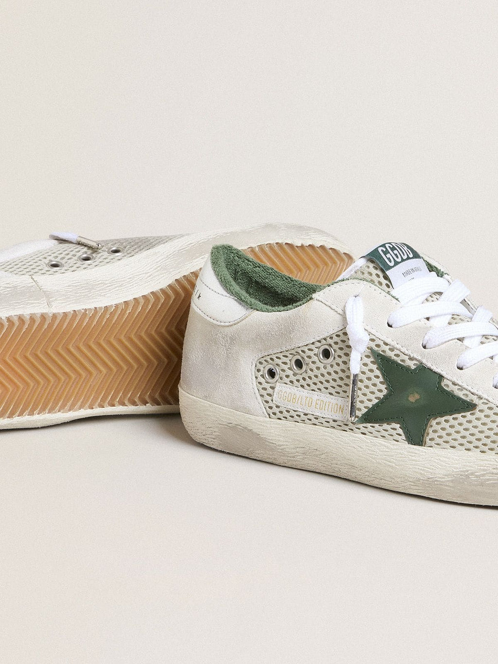 Women’s Super-Star LTD in white suede and mesh with green leather star and silver foiled leather heel tab