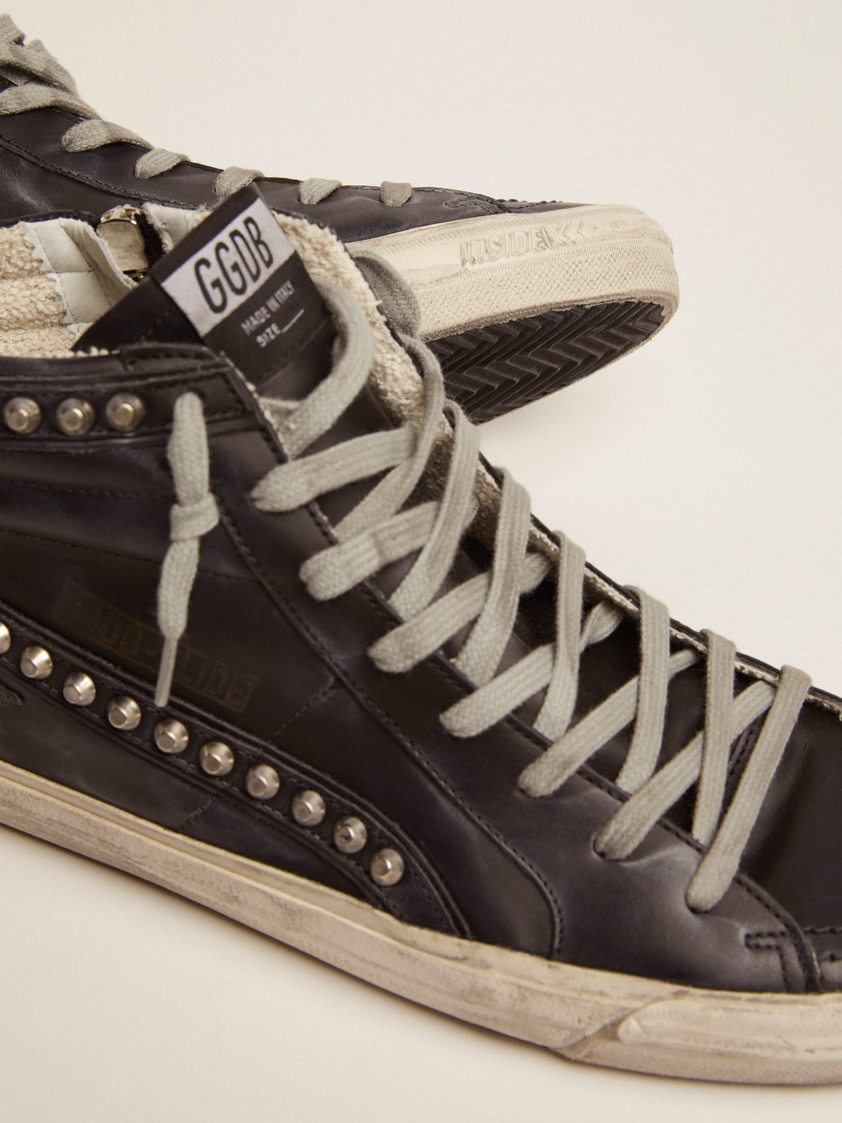Sneakers Slide uomo con borchie applicate