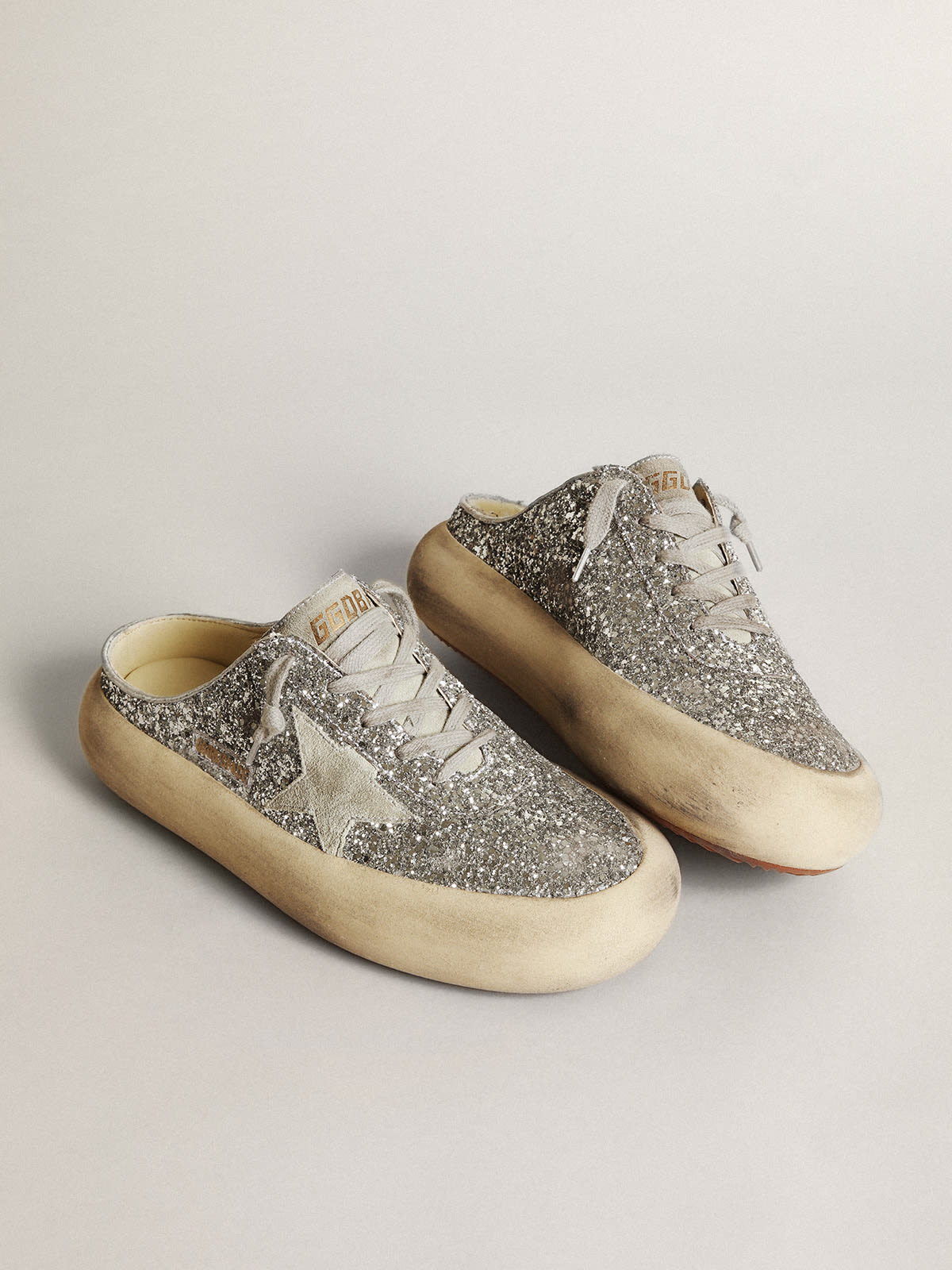 Space-Star Sabot in glitter argento con stella e linguetta in suede grigio ghiaccio